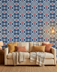 Cosmic Chain blue and red geometric dot bandhani wallpaper in a warm and inviting living room