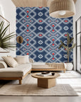 Bandhani-style wallpaper featuring a dotted geometric pattern in navy blue and red (Cosmic Chain)