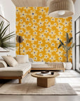 A mustard yellow wallpaper featuring a cream sketched floral design, known as Cosmic Bloom