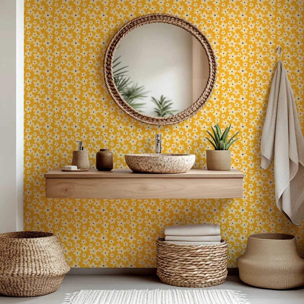 Whimsical wallcovering in mustard yellow featuring a cream hand-drawn floral motif (Cosmic Bloom)