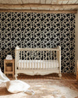 Removable wallpaper featuring a minimalist white background with black hand-drawn star details - Cosmic Dust