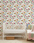 Cottage Scatter pink and blue floral peel and stick wallpaper adding character to a cozy bedroom