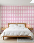 Cotton Candy pink gingham wallpaper adding character to a cozy bedroom