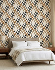 Cracked Facets neutral beige distressed diamond trellis wallpaper adding character to a cozy bedroom