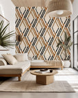Distressed wallpaper featuring a geometric diamond pattern in rustic brown and black tones, described as "Cracked Facets"