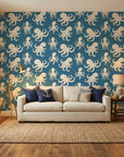 Cresting Wave vibrant teal octopus wallpaper in a warm and inviting living room