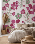 A wallpaper featuring a textured brush finish, painted with a floral design in magenta and green colors. - Crimson Grove