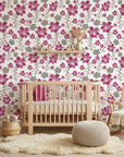 Crimson Grove magenta and green textured ikat floral wallpaper as a feature wall in a bright home office