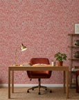 Crimson Relic textured red geometric wallpaper adding character to a cozy bedroom