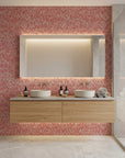 Crimson Relic textured red geometric wallpaper as a feature wall in a bright home office