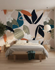 Modern botanical peel and stick wallpaper with geometric leaf forms