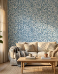 Deep Current coastal blue abstract wallpaper in a warm and inviting living room
