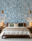 Deep Current coastal blue abstract wallpaper adding character to a cozy bedroom