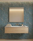 Deep Loom textured blue abstract wallpaper creating ambiance in a serene bathroom