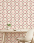 Desert Compass red geometric peel and stick wallpaper as a feature wall in a bright home office