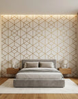 Desert Filigree gold geometric cube wallpaper adding character to a cozy bedroom