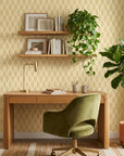 Desert Ritual ochre geometric peel and stick wallpaper as a feature wall in a bright home office