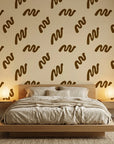 Desert Trace warm beige minimalist abstract mural wallpaper in a warm and inviting living room