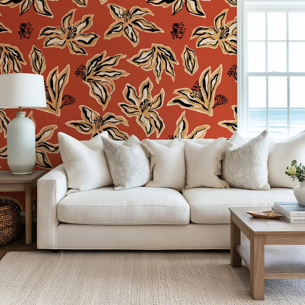 Artistic black floral sketches on a rust orange abstract peel and stick wallpaper