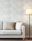 This abstract, uncolored wallpaper features soft texturing achieved by dense, layered linework depicting stylized palm fronds