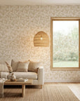 Dew & Gold elegant gold botanical leaf wallpaper in a warm and inviting living room