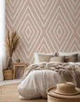 Neutral diamond wallpaper with hand-drawn white linework forming a repeating geometric pattern on a soft beige background.