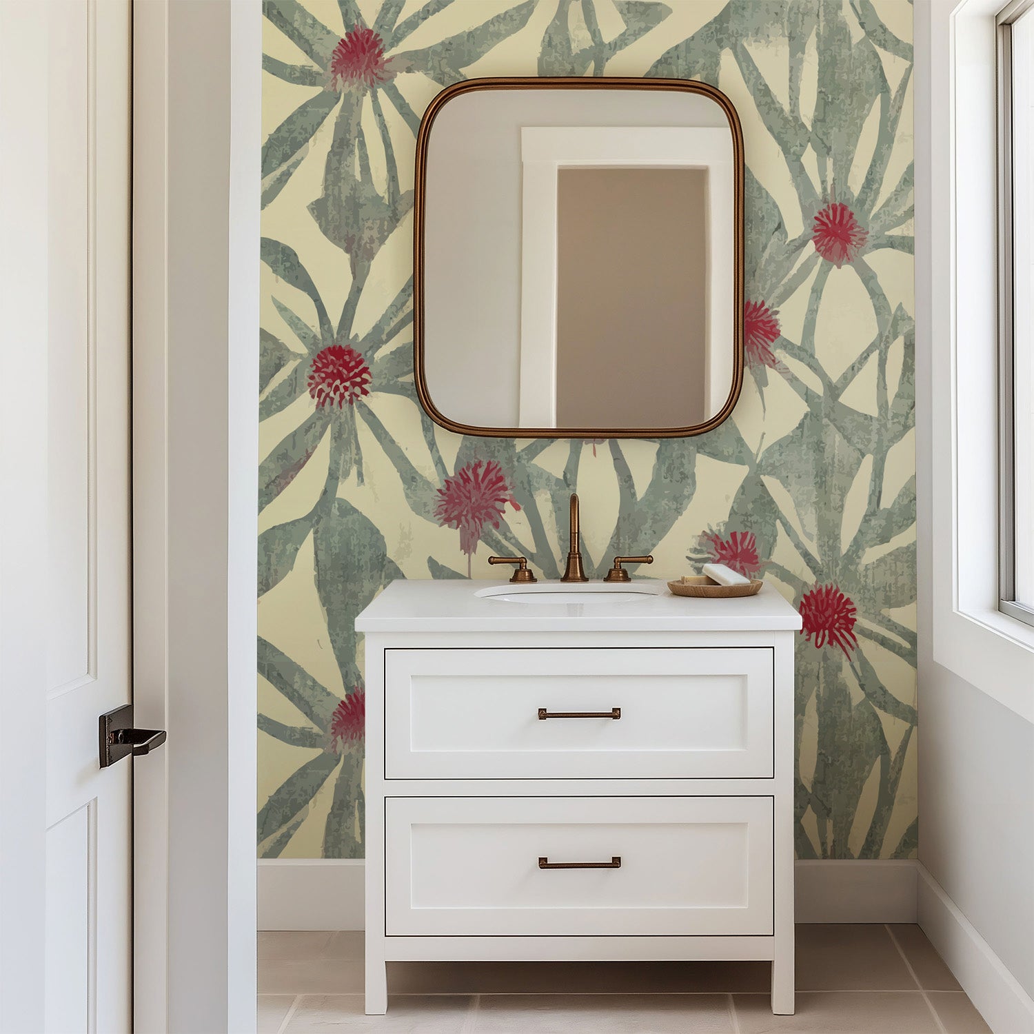 Botanical floral wallpaper with muted green leaves and soft red flower centers on a warm cream background, creating an organic hand-painted pattern.