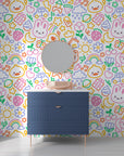 Scribbled sweet animal motifs in a rainbow palette on easy-to-apply temporary wallpaper - Doodle Dreams