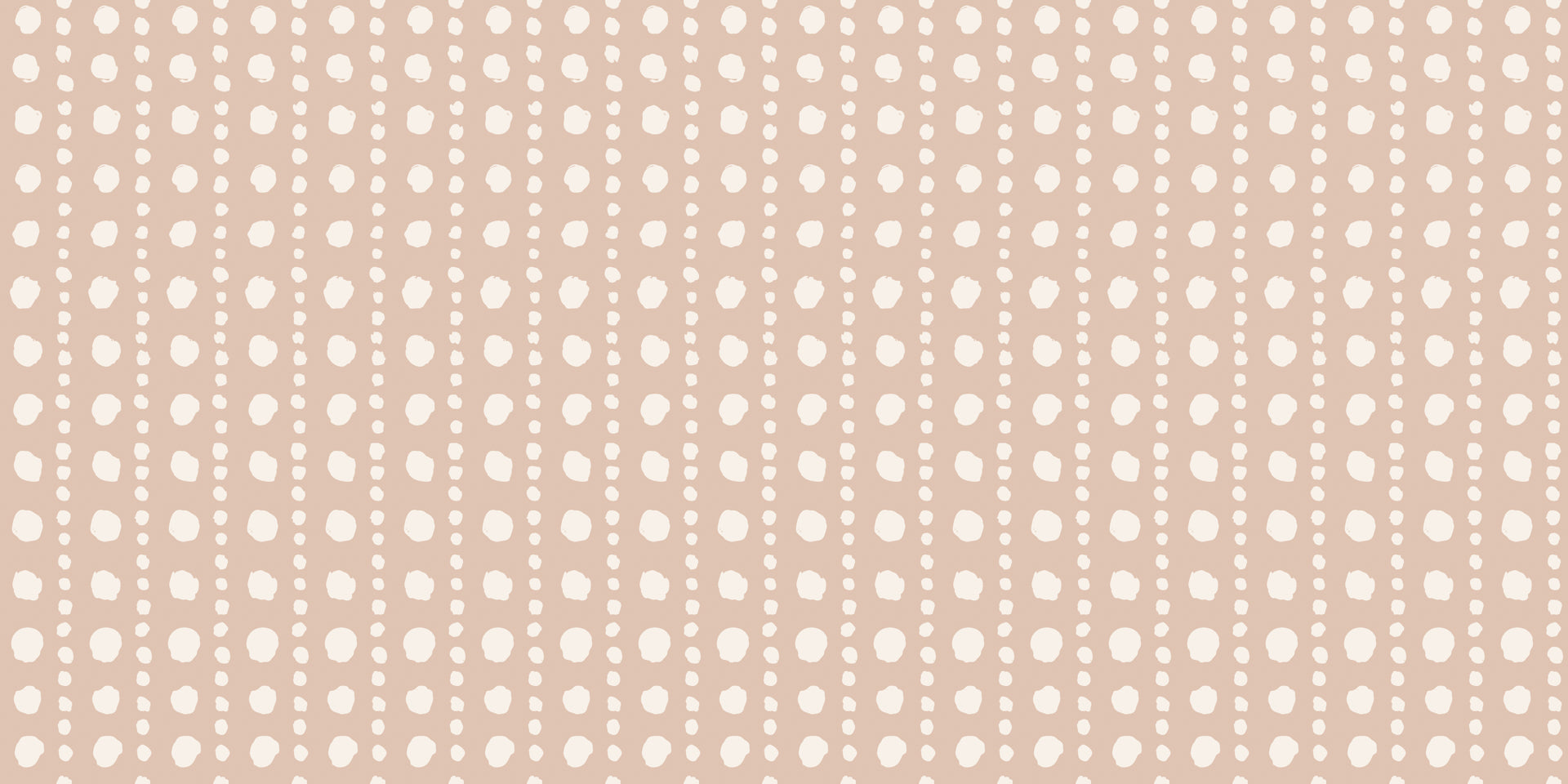 Neutral polka dot wallpaper with soft white hand-painted dots arranged in a subtle grid on a warm beige background.
