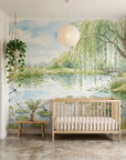 Watercolor Dragonfly Dreams wallpaper mural featuring willow tree, pond with lily pads, and dragonflies in nursery setting