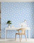 Dream Drops light blue polka dot wallpaper as a feature wall in a bright home office