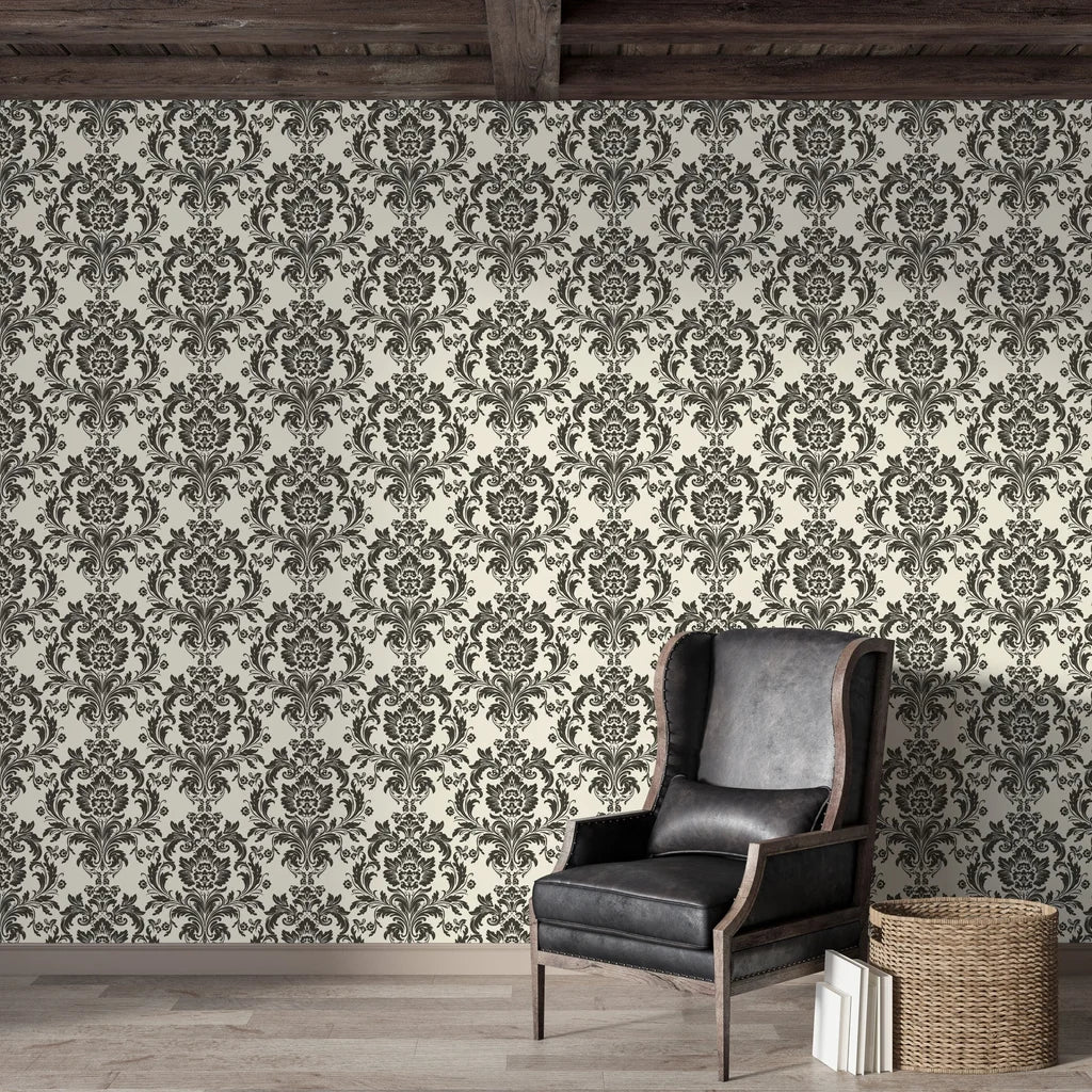 Classic damask wallpaper with charcoal gray ornate motifs on cream background in styled living room