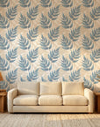 Driftwood Fern blue botanical peel and stick wallpaper in a warm and inviting living room