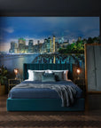 Manhattan skyline twilight mural wallpaper featuring Driftwood & Dreams pattern in teal bedroom setting