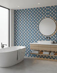 Duckling Waltz whimsical blue nursery wallpaper creating ambiance in a serene bathroom