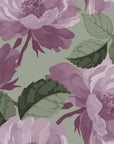 Painterly mauve roses forming a floral wallpaper design on a sage green backdrop