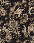 Self-adhesive wallpaper featuring a deep brown and black moody traditional paisley design (Earthen Whispers)