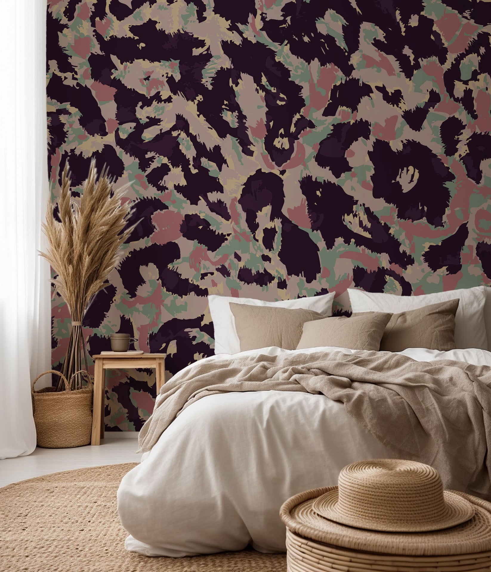 A removable adhesive wallpaper featuring an abstract design of pink and green leopard spots, titled Earthy Echoes
