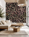 Self-adhesive wallpaper featuring an abstract animal spot design in vibrant pink and green tones, part of the Earthy Echoes collection
