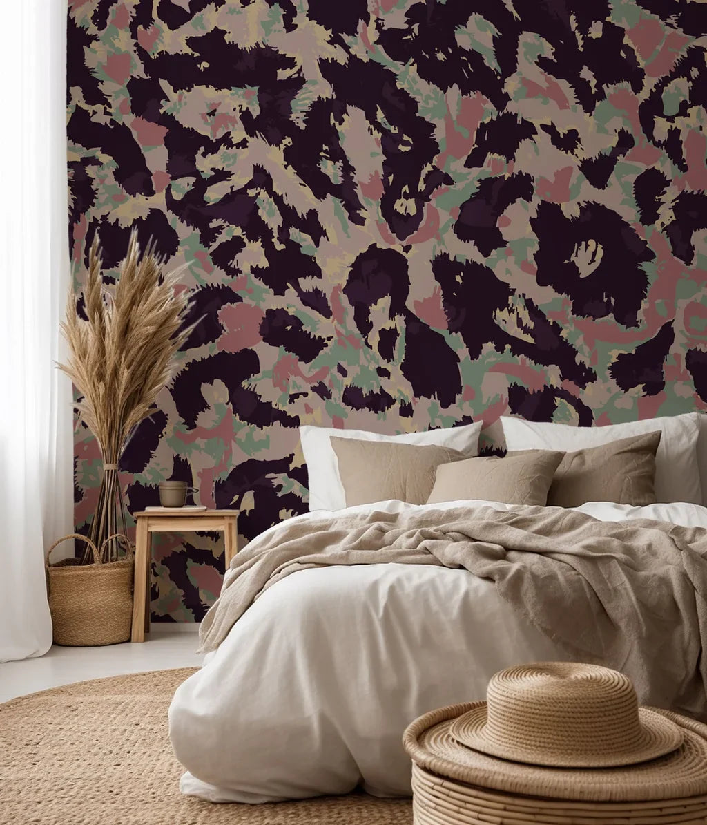 A removable adhesive wallpaper featuring an abstract design of pink and green leopard spots, titled Earthy Echoes