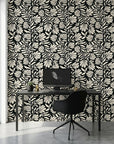 Ebony Garden black and cream floral silhouette wallpaper as a feature wall in a bright home office
