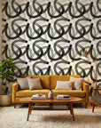 Echo Bound Black white abstract curved line wallpaper in a warm and inviting living room