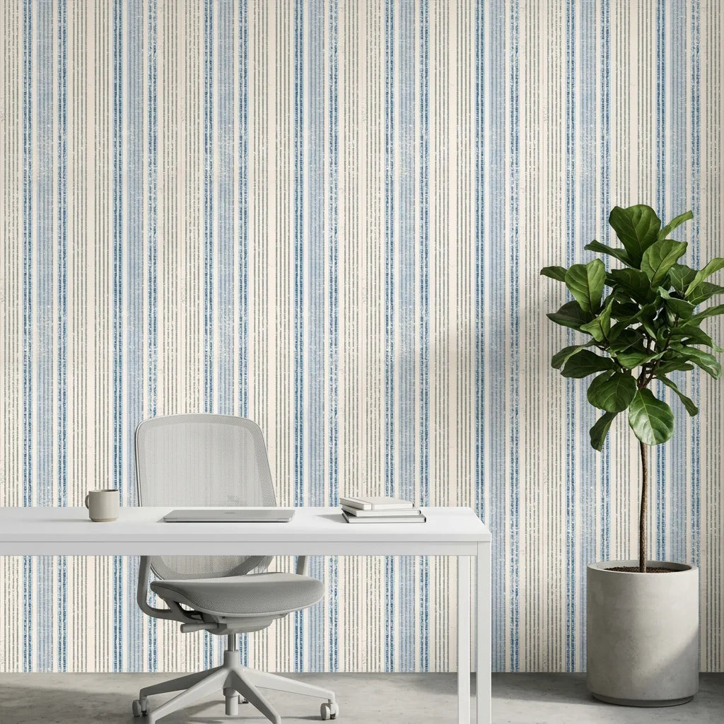 Ecliptic Flow blue grey distressed stripe wallpaper as a feature wall in a bright home office