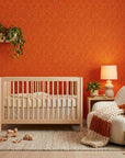 Electric Saffron vibrant red and yellow retro stripe wallpaper as a feature wall in a bright home office