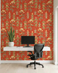 Ember Meadow terracotta and green wildflower wallpaper as a feature wall in a bright home office