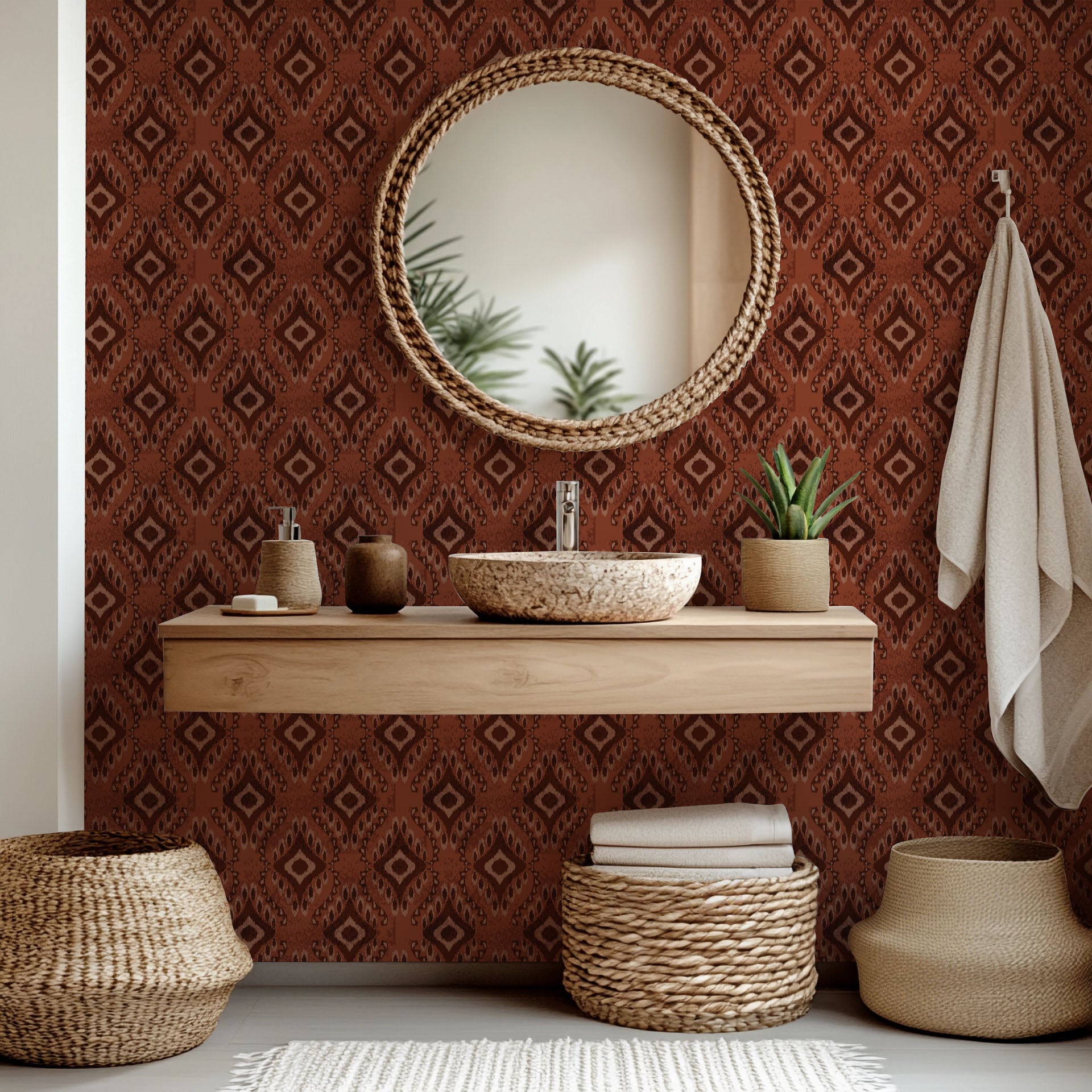 Peel and stick wallpaper, known as 'Ember Wings,' featuring a geometric Ikat pattern in rust brown and beige tones