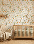 Ember & Leaf orange floral peel and stick wallpaper in a warm and inviting living room
