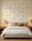 Ember & Leaf orange floral peel and stick wallpaper adding character to a cozy bedroom