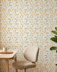 Ember & Leaf orange floral peel and stick wallpaper as a feature wall in a bright home office