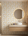 Ember & Leaf orange floral peel and stick wallpaper creating ambiance in a serene bathroom